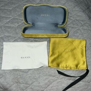 Gold/Mustard Gucci sunglasses case with baby blue interior with bag and cloth